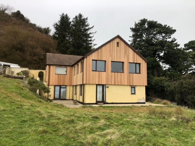Co2 Cedar® Canadian Western Red Cedar Shadow gap 52 52 Co2 Cedar Shadow Gap Cladding on House Canadian Western Red Cedar