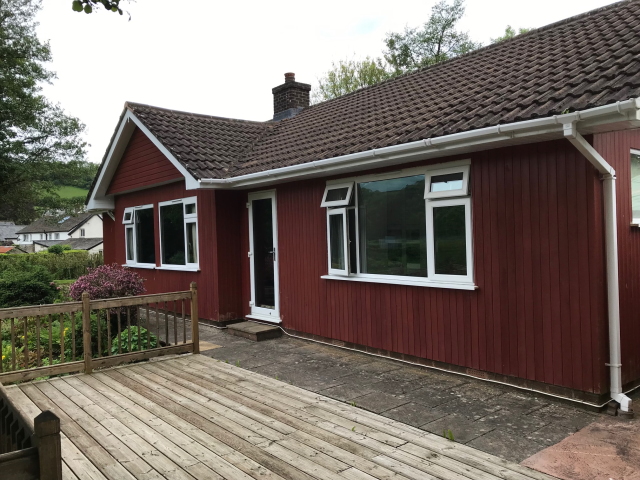 Co2 Cedar® House Clad in Western Red Cedar Shadow Gap 35 35 Co2 Cedar® House Cladding in Red Cedar